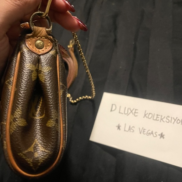 Authentic LV Eva clutch with sling - Picture 3 of 8